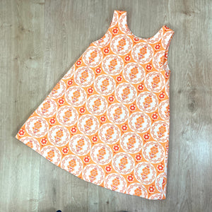 Schürzen-Kleid aus 70-Jahre-Stoff in Orange